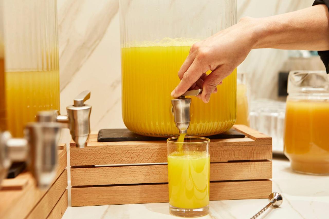Grand Plaza Hotel & Wellness Андора ла Веля Екстериор снимка Orange juice